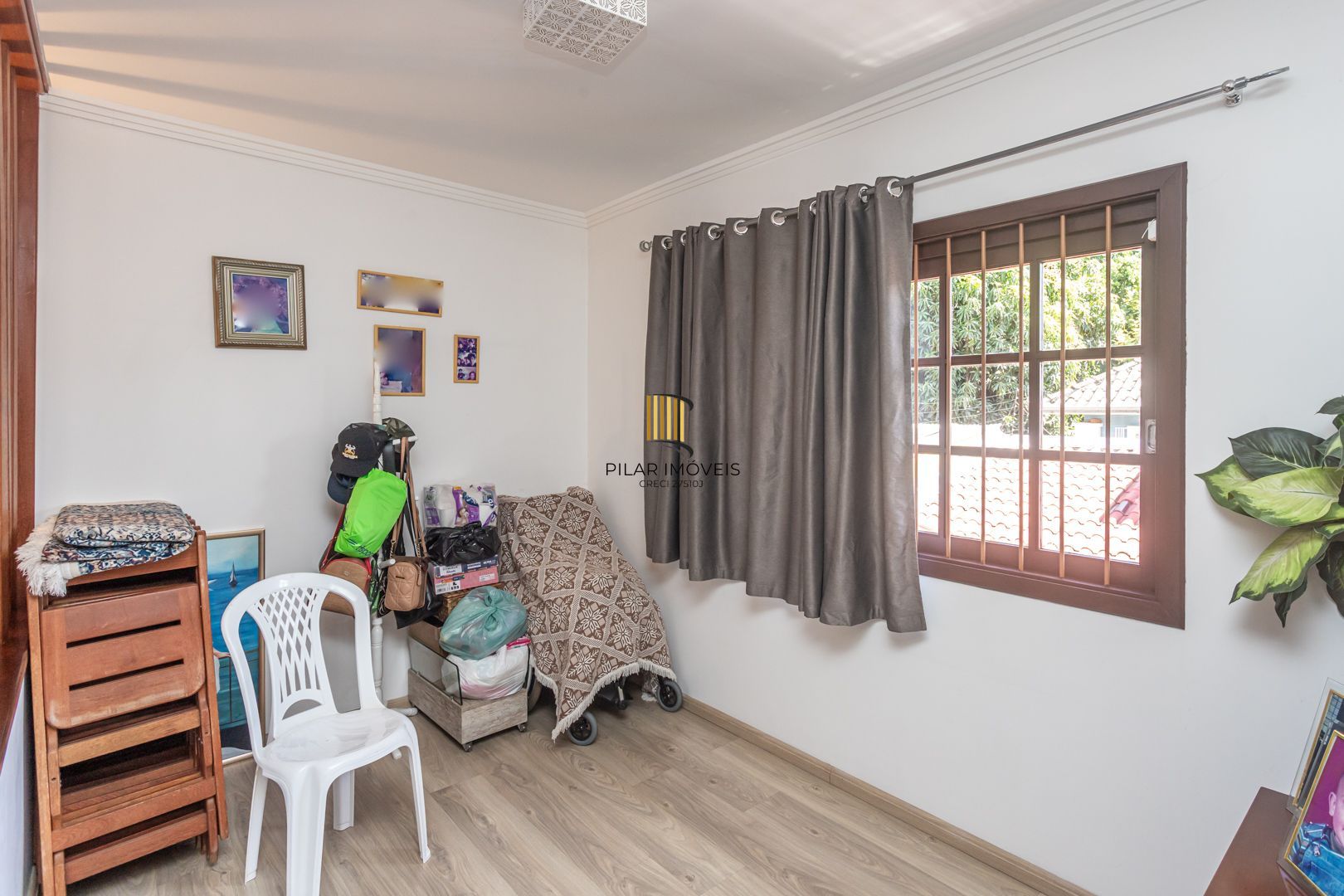 Casa 3 dormitórios no bairro Camaquã