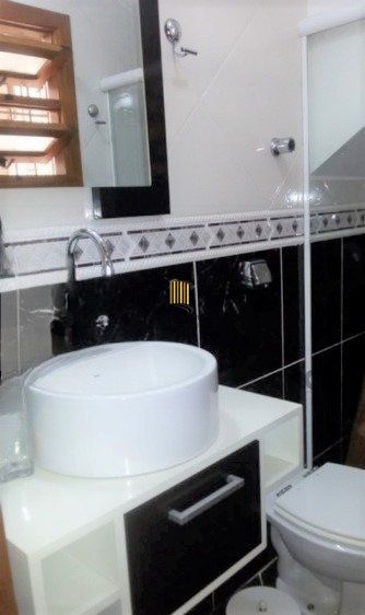 Casa em condomínio no Partenon de 3 dormitórios e vaga