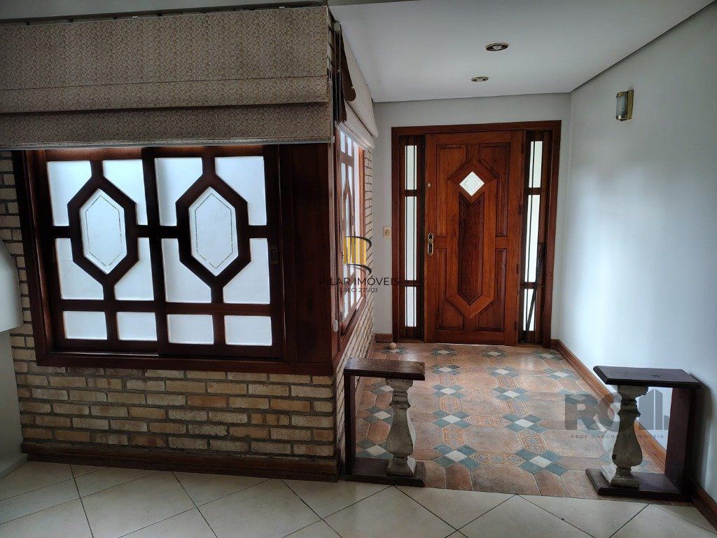 Casa sobrado com 300m² na Vila Nova de 3 dormitórios e 4 vagas