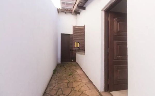 Casa no bairro Jardim Botânico de 4 dormitórios e 3 vagas