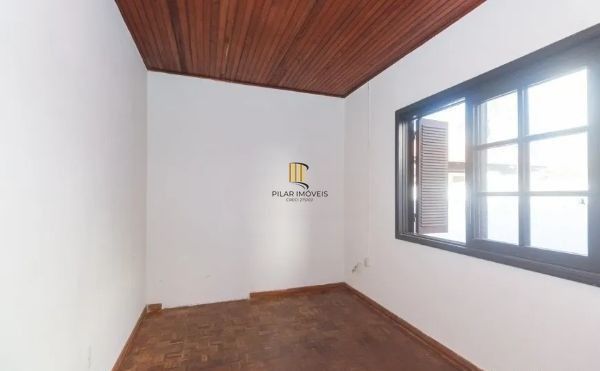 Casa no bairro Jardim Botânico de 4 dormitórios e 3 vagas