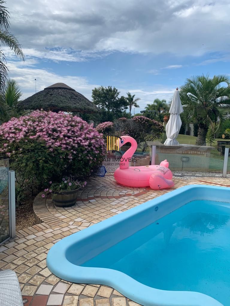 Casa na praia de Atlântida de 4 dormitórios