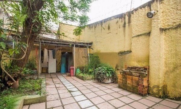 Casa sobrado no bairro Rio Branco de 4 dormitórios e vaga