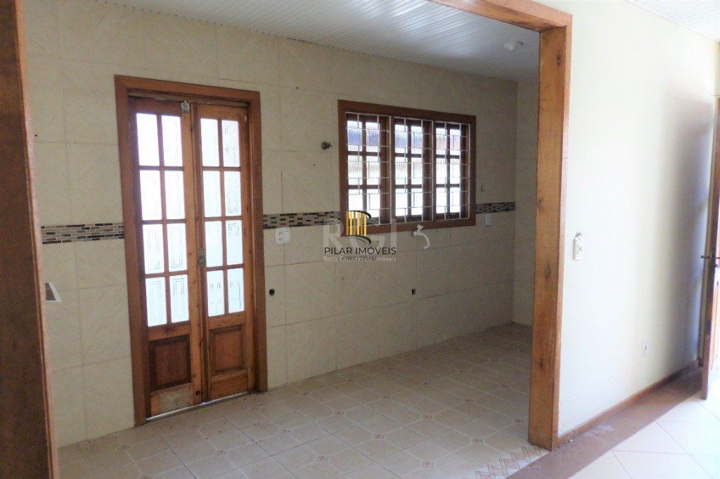 Casa na Hípica com 3 dormitórios e 2 vagas