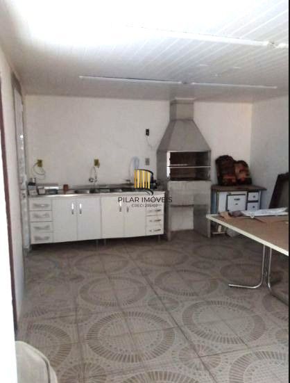 Casa sobrado no bairro Santo Antônio de 4 dormitórios e 2 vagas