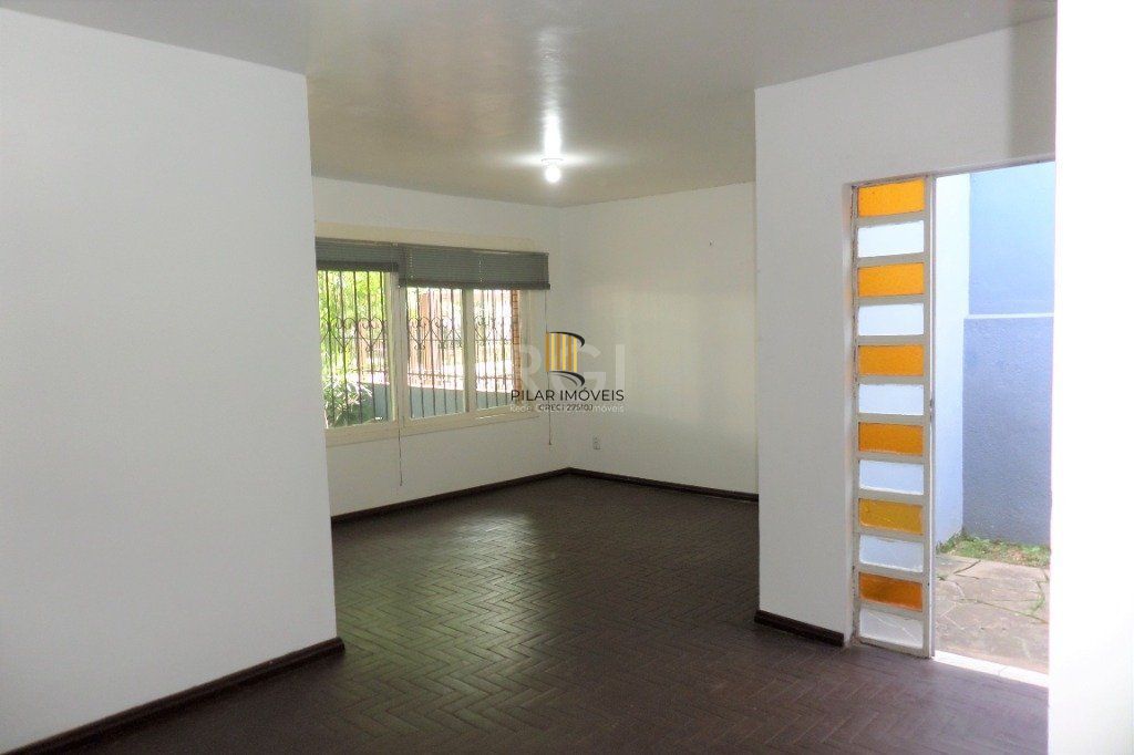 Casa no bairro Jardim Botânico de 3 dormitórios e 2 vagas