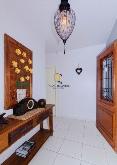 Casa no bairro Tristeza de 4 dormitórios e 4 vagas