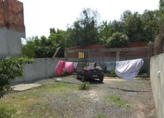 Casa 3 dormitórios no bairro Piratini