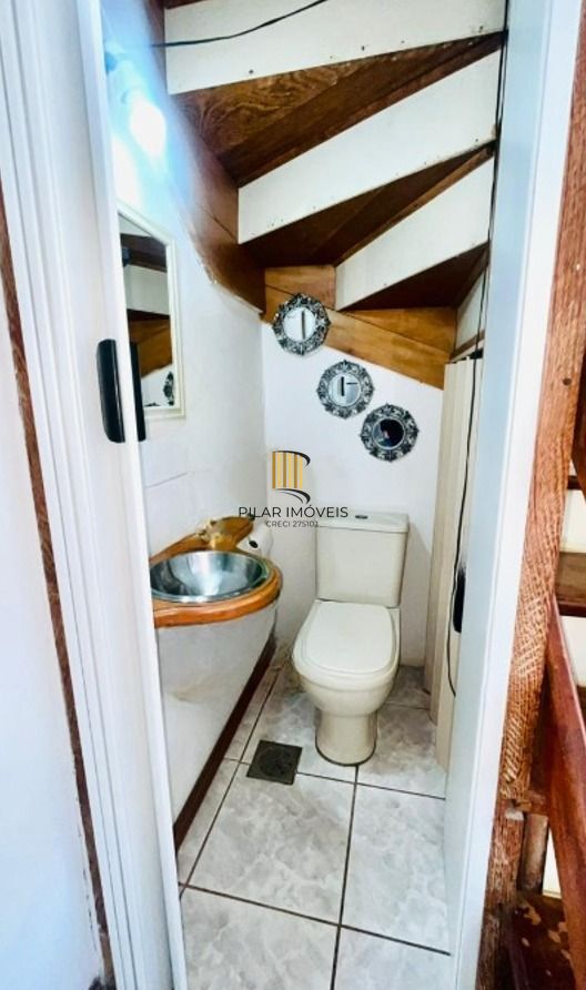 Casa em condomínio no bairro Sarandi de 2 dormitórios, vaga e infra