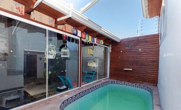 Casa no bairro Tristeza de 4 dormitórios e 4 vagas