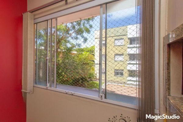 Apartamento 2 dorms, 1 vaga de garagem, à venda Rua Mura, Guarujá - Porto Alegre