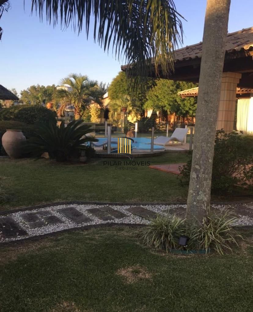 Casa na praia de Atlântida de 4 dormitórios