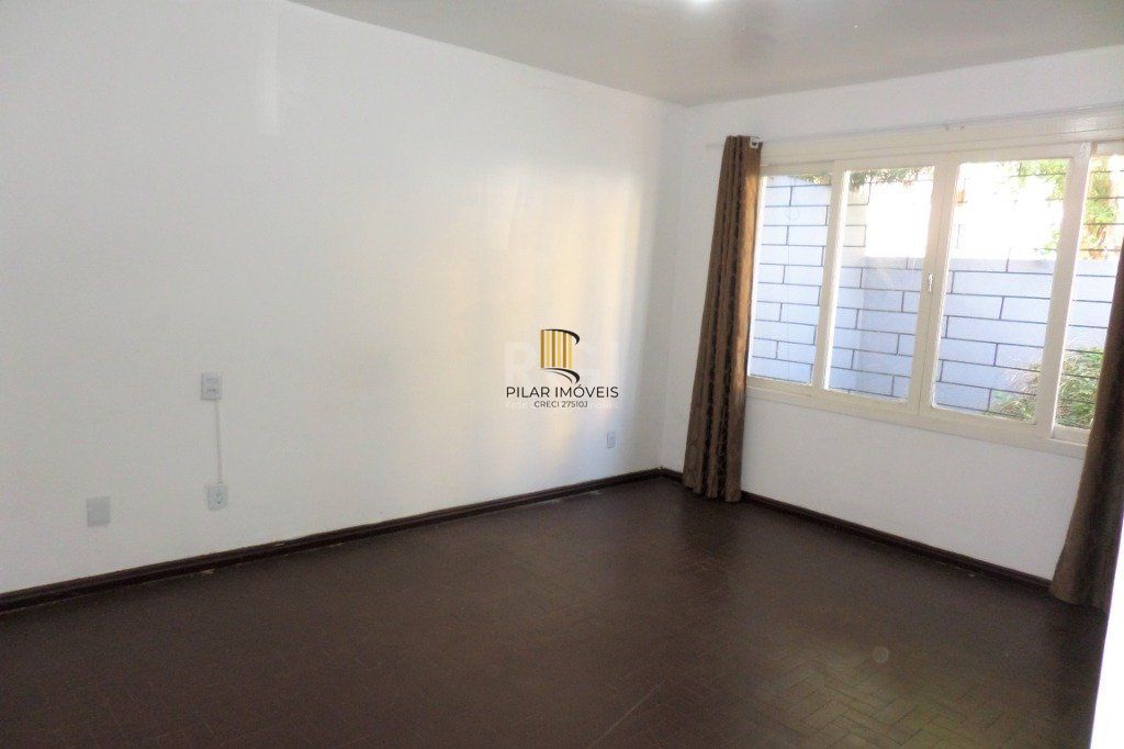 Casa no bairro Jardim Botânico de 3 dormitórios e 2 vagas