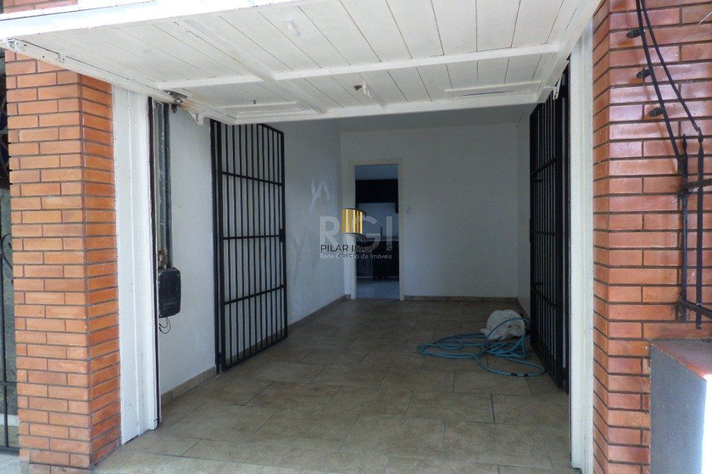 Casa no bairro Jardim Botânico de 3 dormitórios e 2 vagas