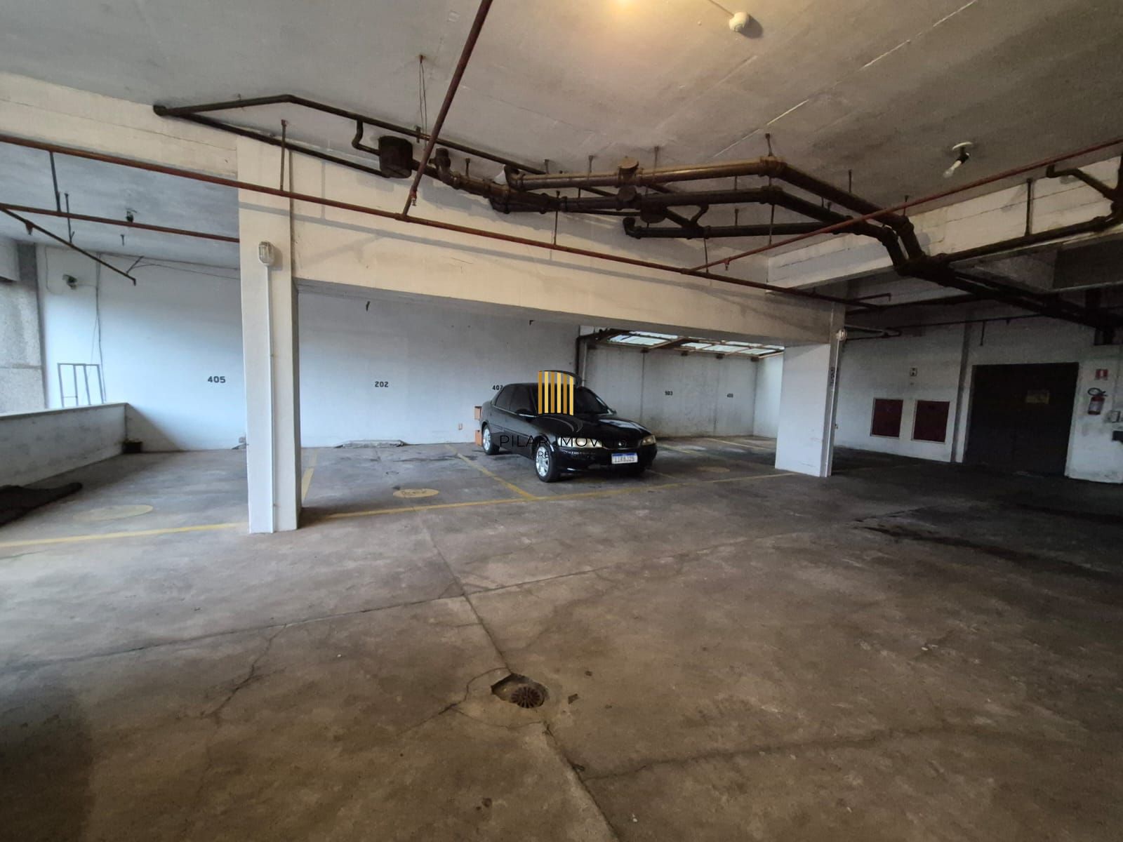 Sala comercial com vaga de garagem