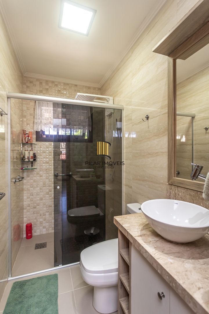 Casa 3 dormitórios no bairro Camaquã