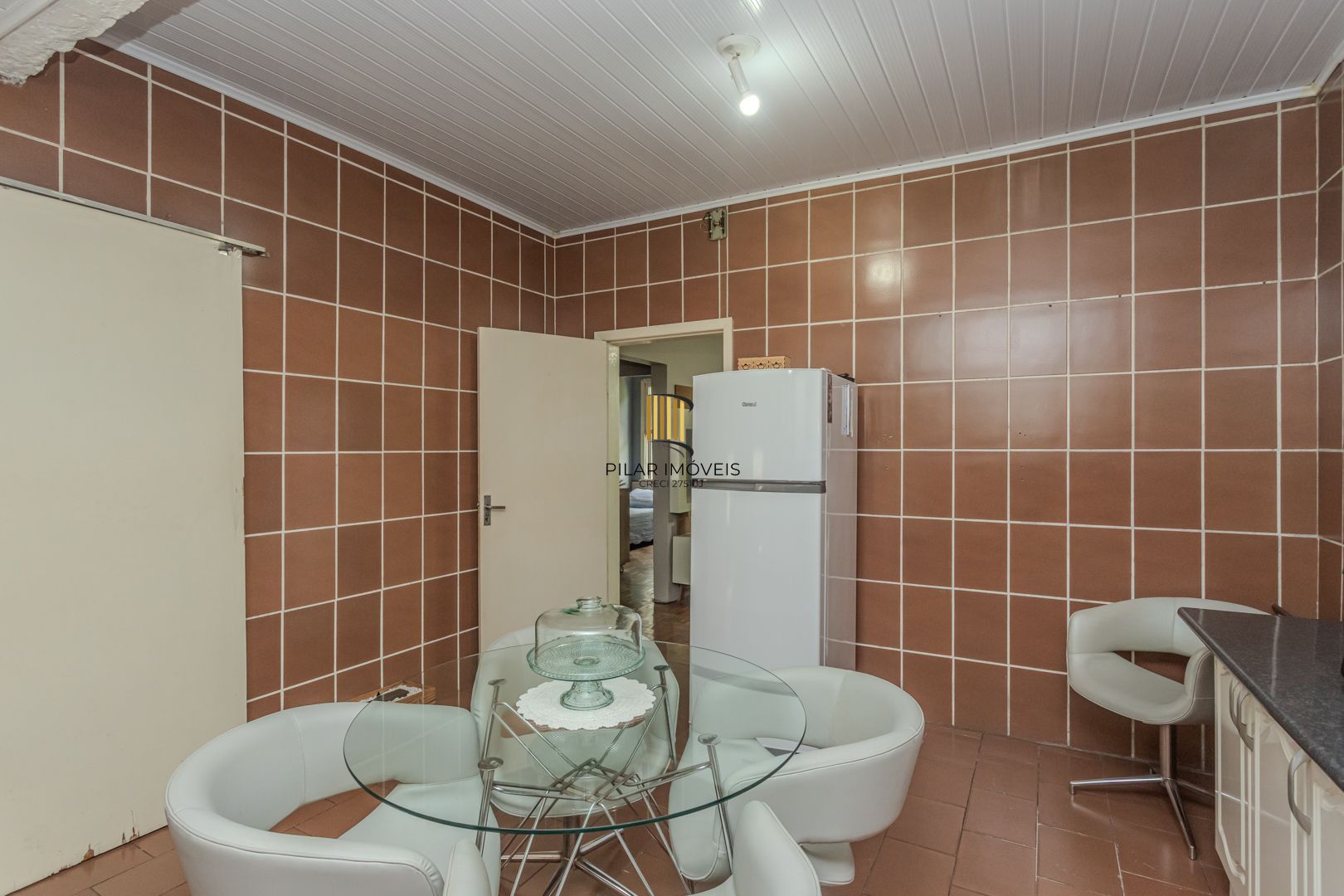 Casa no bairro Jardim Botânico de 3 dormitórios e garagem e terreno com 370m²