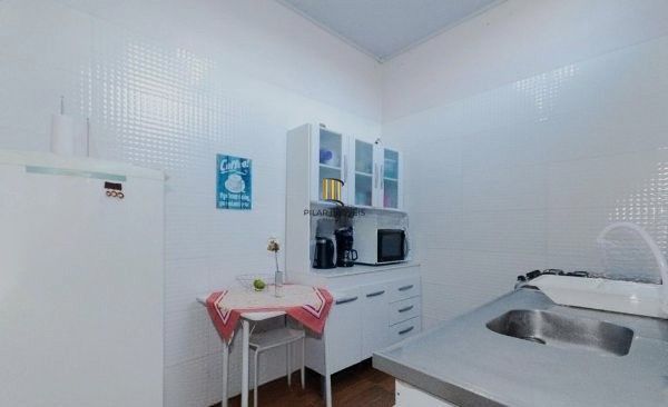 Casa no bairro Tristeza de 4 dormitórios e 4 vagas