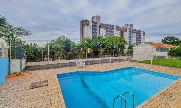 Casa em condomínio no bairro Santo Antômnio de 4 dormitórios e 2 vagas