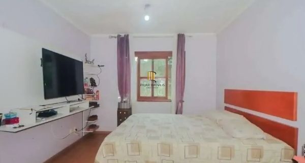 Casa sobrado no bairro Vila Ipiranga de 4 dormitórios e 2 vagas