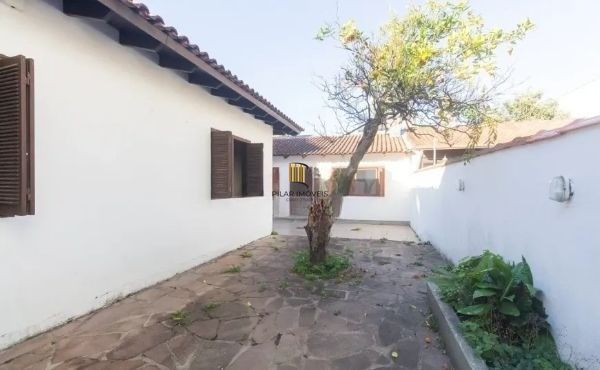 Casa no bairro Jardim Botânico de 4 dormitórios e 3 vagas