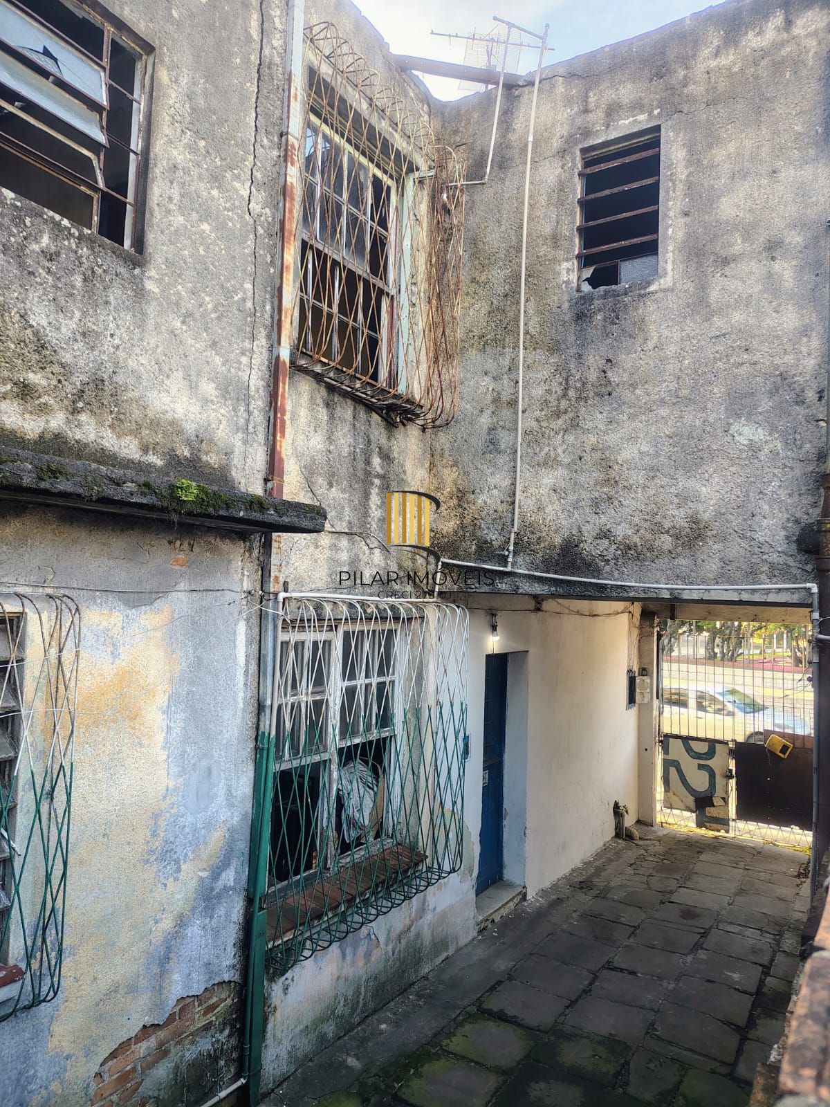 Casa e terreno no Partenon