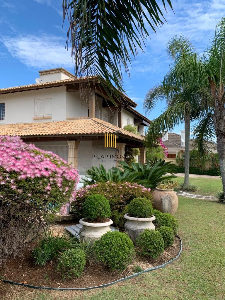 Casa na praia de Atlântida de 4 dormitórios - Pilar Imóveis