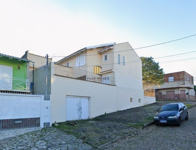Casa sobrado no bairro Santo Antônio de 4 dormitórios e 2 vagas