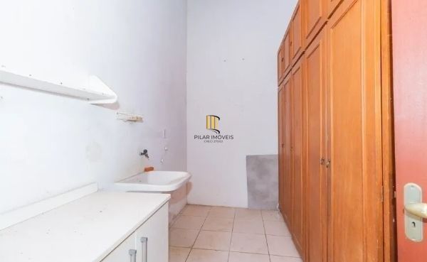 Casa no bairro Jardim Botânico de 4 dormitórios e 3 vagas