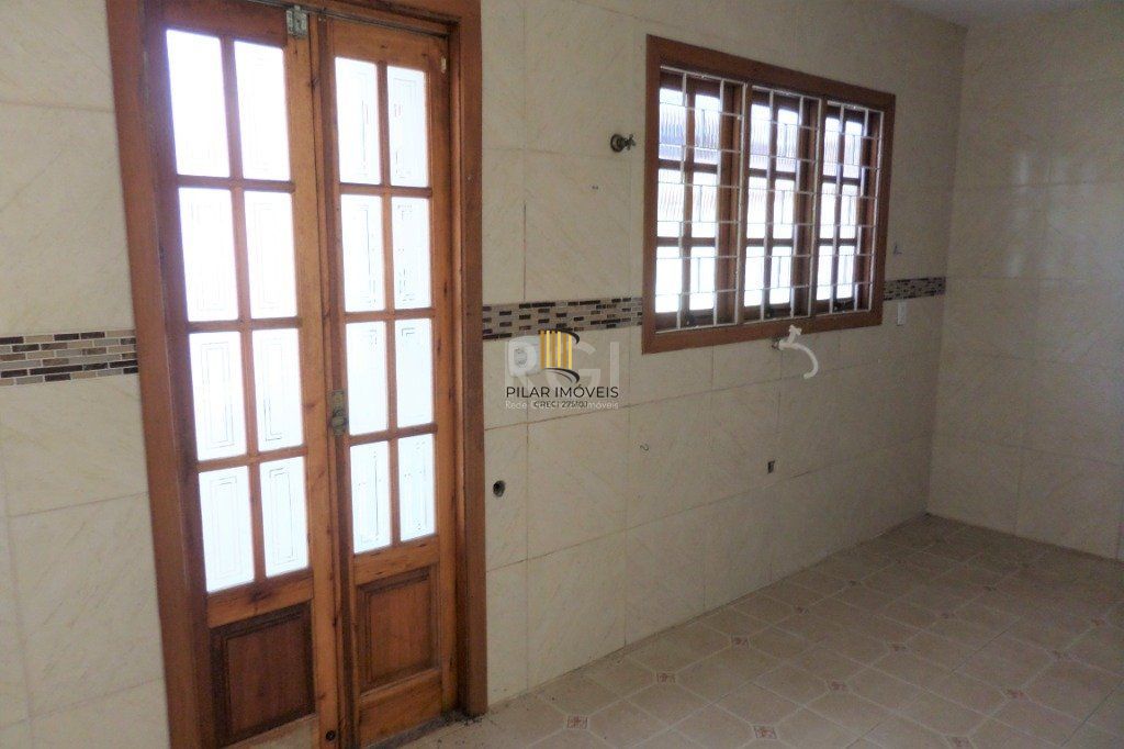 Casa na Hípica com 3 dormitórios e 2 vagas