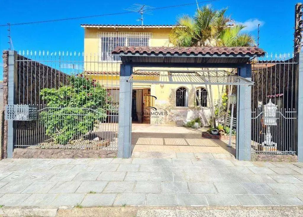 Sobrado 3 dormitórios no bairro Jardim Algarve - Pilar Imóveis