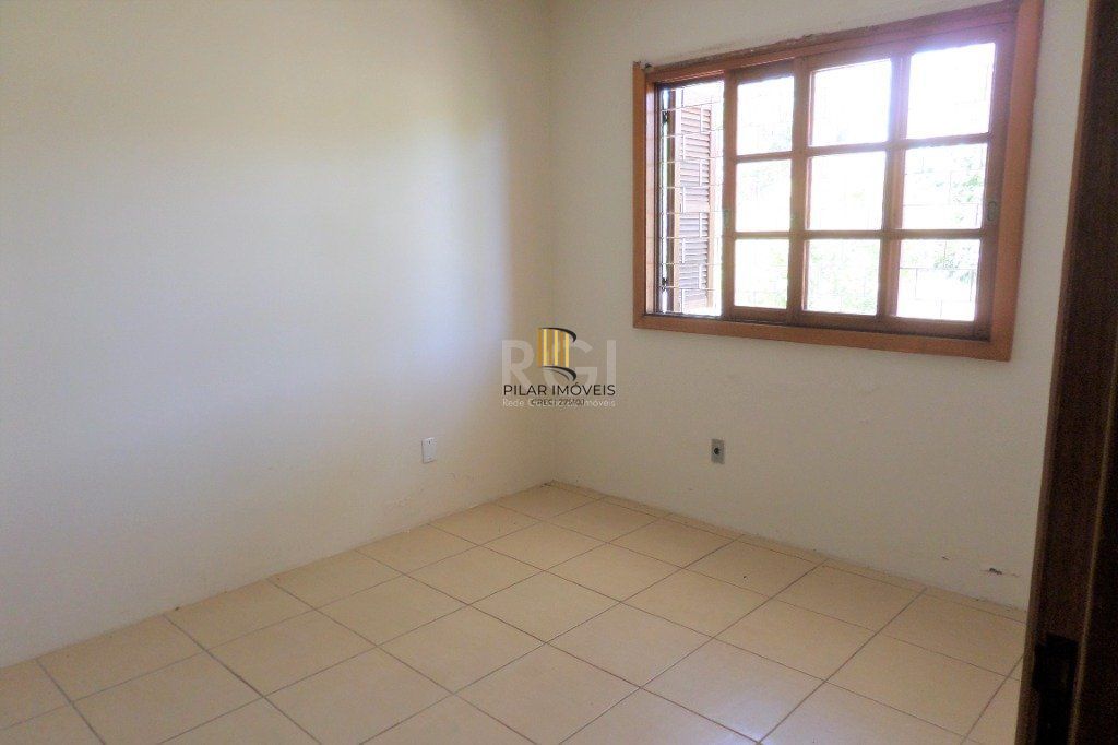 Casa na Hípica com 3 dormitórios e 2 vagas