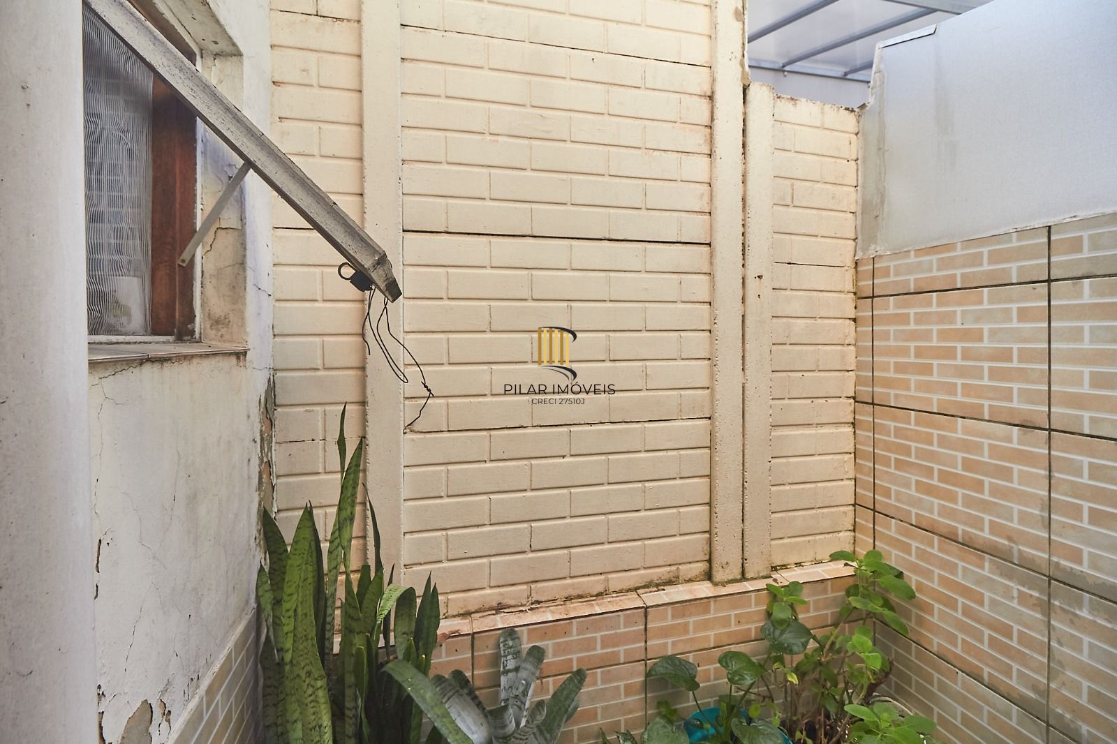 Casa sobrado em condomínio fechado no Alto Petrópolis de 2 dormitórios e vaga
