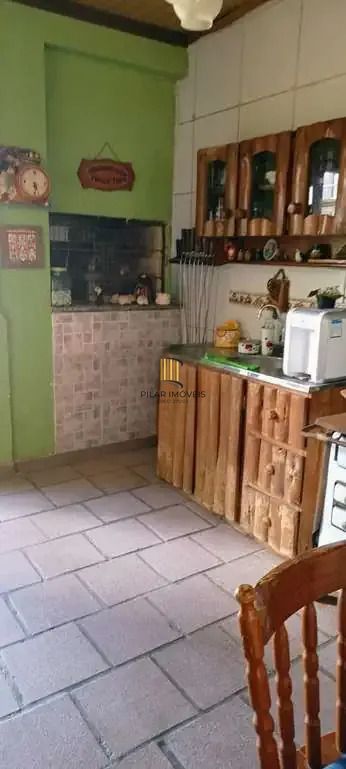 Casa 3 dormitórios no bairro Jardim Algarve