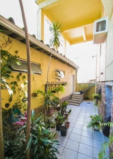 Casa sobrado no Petrópolis com 7 dormitórios e 4 vagas