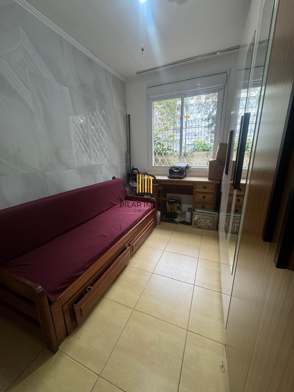 Apartamento térreo de 2 dormitórios, Menino Deus DESOCUPADO