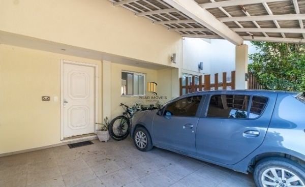 Sobrado condomínio no bairro Teresópolis de 4 dormitórios 2 vagas e infra