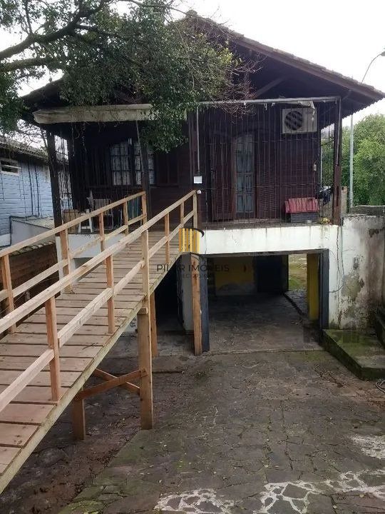 Casa 4 dormitórios no bairro Partenon - Pilar Imóveis