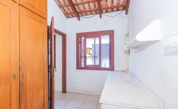 Casa no bairro Jardim Botânico de 4 dormitórios e 3 vagas