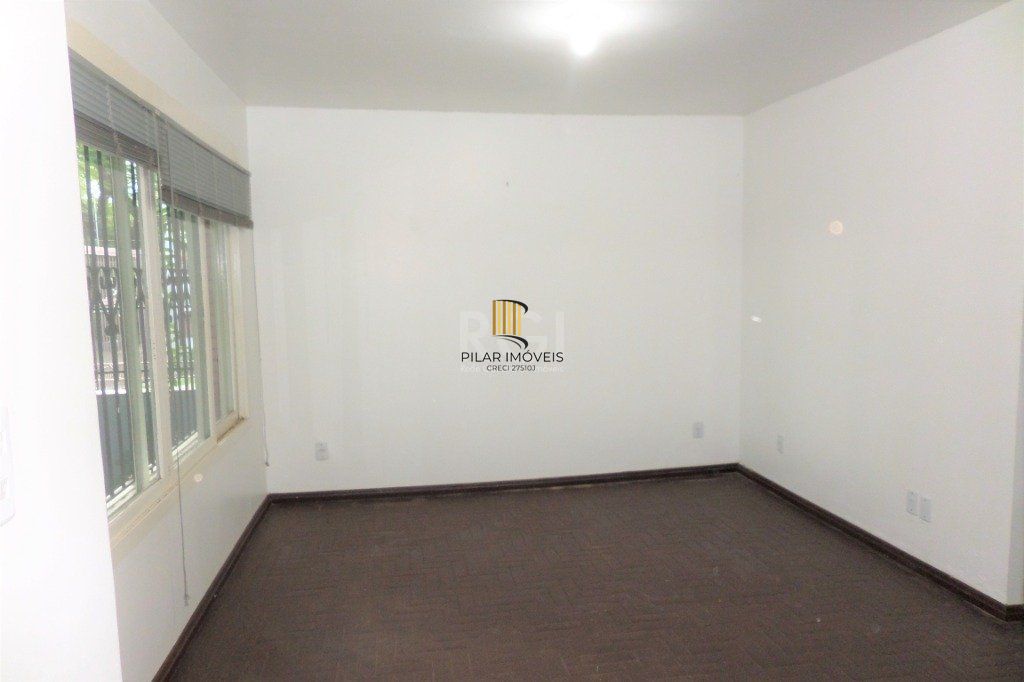 Casa no bairro Jardim Botânico de 3 dormitórios e 2 vagas