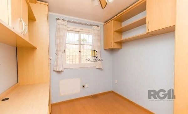 Sobrado no bairro Tristeza de 3 dormitórios e vaga DESOCUPADO