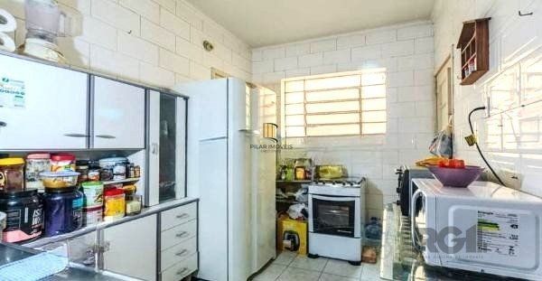 Apartamento no bairro Auxiliadora de 3 dormitórios