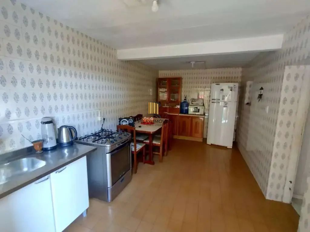 Casa 5 dormitórios no bairro Partenon