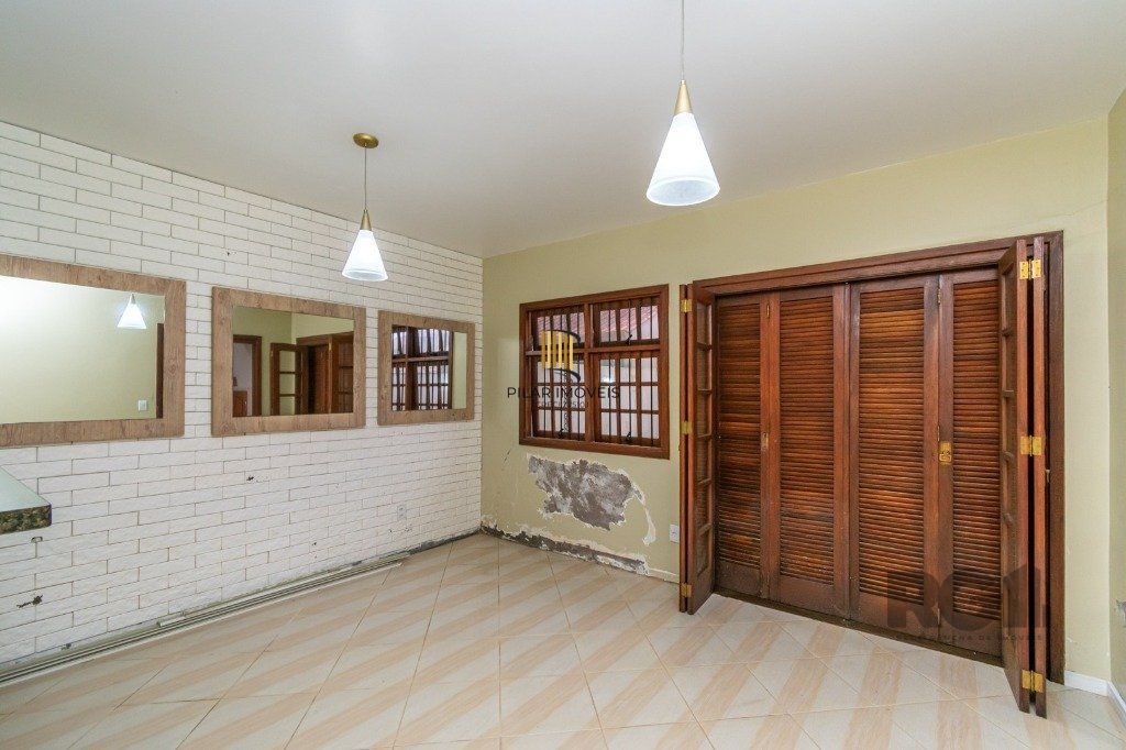 Casa Condominio no bairro Guarujá de 3 dormitórios 1 vaga DESOCUPADA