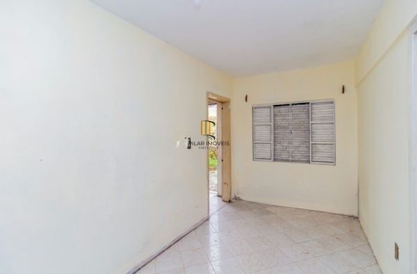 Casa / Terreno com 3 casas de alvenaria no bairro Morro Santana