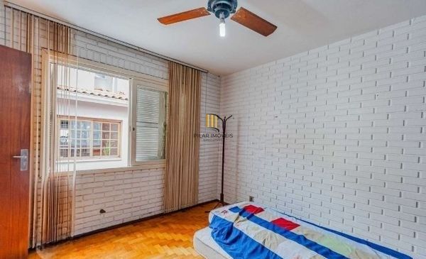 Casa em condomínio no bairro Santo Antômnio de 4 dormitórios e 2 vagas