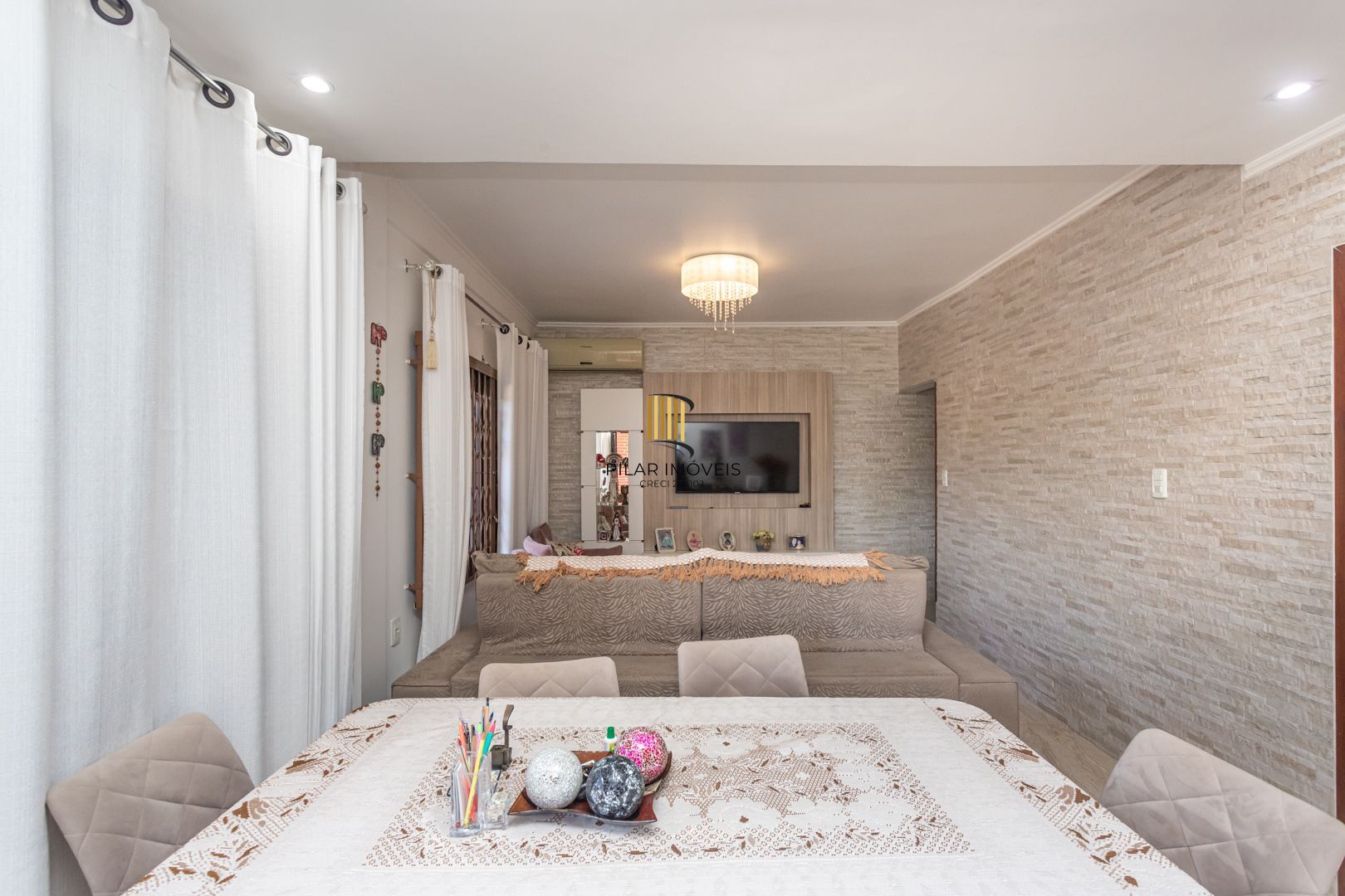 Casa 3 dormitórios no bairro Camaquã