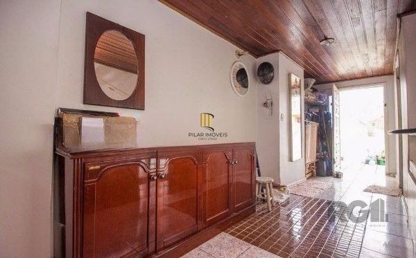 Casa sobrado no bairro Rio Branco de 4 dormitórios e vaga