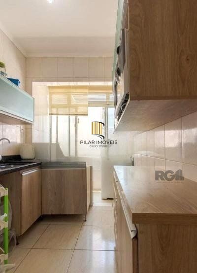 Apartamento no bairro Auxiliadora de 2 dormitórios