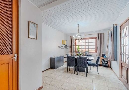 Casa em condomínio no bairro Santo Antômnio de 4 dormitórios e 2 vagas